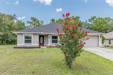 WOW HURRY AND GET THIS 4/2/2 CAR GARAGE HOME SUGARMILL WOODS!! - photo 2