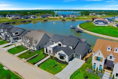 Experience lakeside living at its finest in this exquisite - photo 1