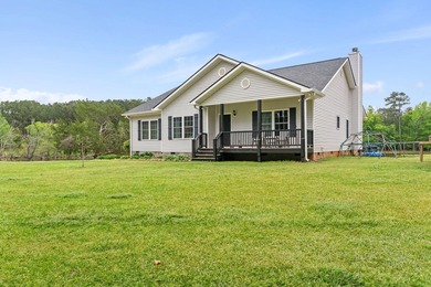 Tucked away behind a private, cypress-lined driveway lies a - photo 2