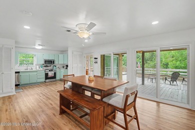 Enjoy peaceful waterfront living on the Biloxi River just a few - photo 9