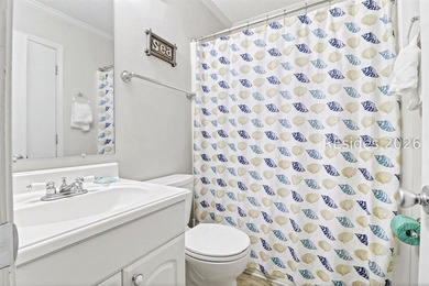 Welcome to this bright two-bedroom, two-bath villa in Hilton - photo 17