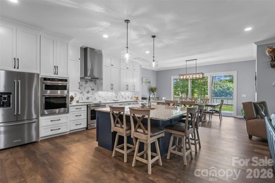 Experience ultimate luxury in this custom-built ranch home - photo 11