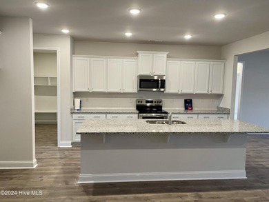 The 2906 floor plan is a spacious and well-designed single-story - photo 11