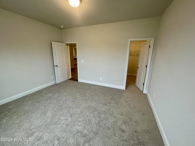 The 2906 floor plan is a spacious and well-designed single-story - photo 12