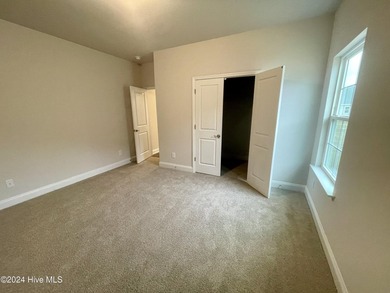 The 2906 floor plan is a spacious and well-designed single-story - photo 14