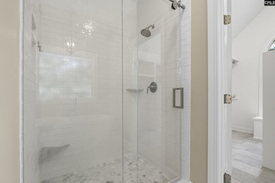 An all-brick home deserves a setting to match, and this property - photo 15