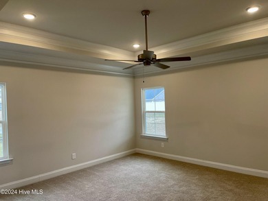 The 2906 floor plan is a spacious and well-designed single-story - photo 15