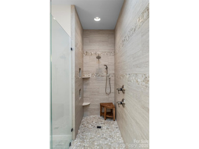 Experience ultimate luxury in this custom-built ranch home - photo 18