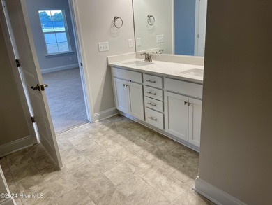 The 2906 floor plan is a spacious and well-designed single-story - photo 19