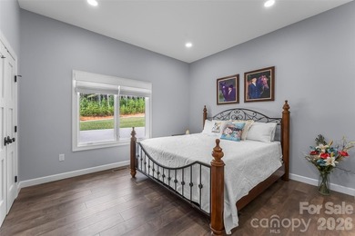 Experience ultimate luxury in this custom-built ranch home - photo 25