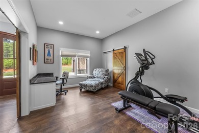 Experience ultimate luxury in this custom-built ranch home - photo 27