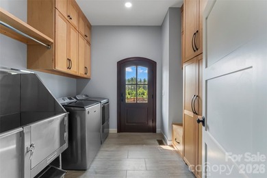 Experience ultimate luxury in this custom-built ranch home - photo 28