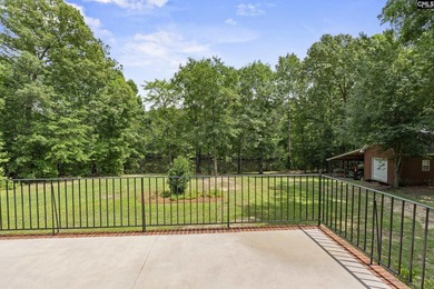 An all-brick home deserves a setting to match, and this property - photo 30
