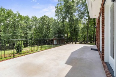 An all-brick home deserves a setting to match, and this property - photo 31