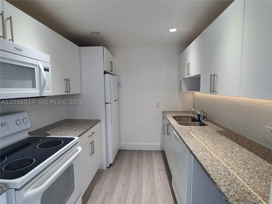 Renovated 2 bedroom 2 bathroom unit centrally located near - photo 8