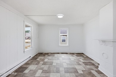 Move-in ready and full of opportunity! This charming 3-bedroom - photo 3