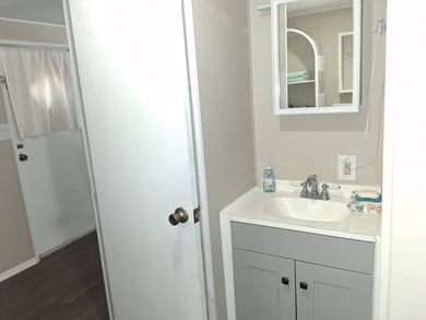 This home has 2 bedrooms and 1-1/2 baths and was completely - photo 13