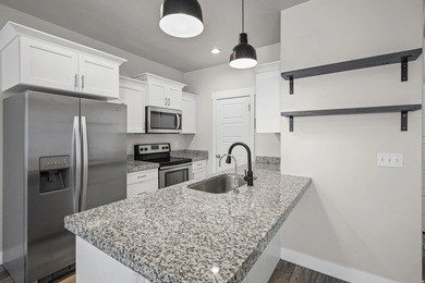 Come check out this 4-bedroom townhome in the heart of West Utah - photo 3