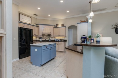 EXQUISTIE FLORIDA LIVING ABOUNDS IN THIS INVITING 3/2/2 WITH DEN - photo 17