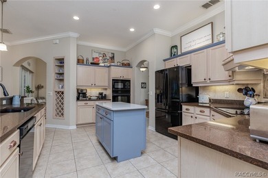 EXQUISTIE FLORIDA LIVING ABOUNDS IN THIS INVITING 3/2/2 WITH DEN - photo 18