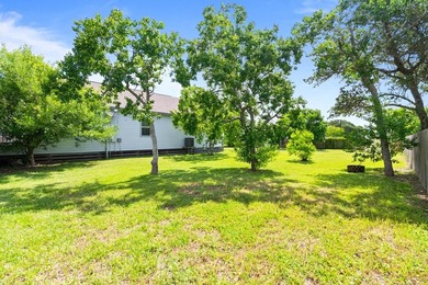Situated on two spacious lots, this charming 3-bedroom, 2-bath - photo 25