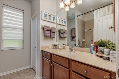 EXQUISTIE FLORIDA LIVING ABOUNDS IN THIS INVITING 3/2/2 WITH DEN - photo 31
