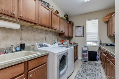 EXQUISTIE FLORIDA LIVING ABOUNDS IN THIS INVITING 3/2/2 WITH DEN - photo 32