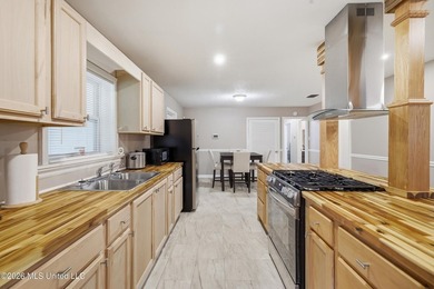 Welcome home to this beautifully updated 4-bedroom, 2-bath home - photo 3