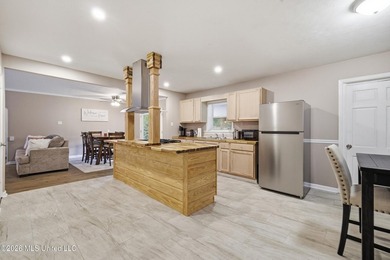 Welcome home to this beautifully updated 4-bedroom, 2-bath home - photo 4