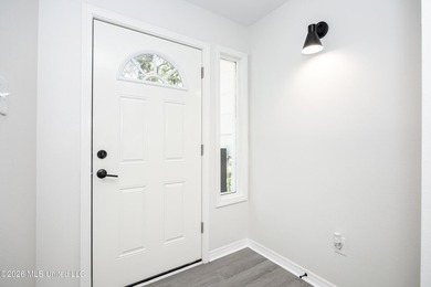 Stunning newly renovated white brick home in DOWNTOWN GOLF CART - photo 5