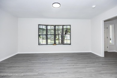 Stunning newly renovated white brick home in DOWNTOWN GOLF CART - photo 7