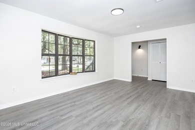 Stunning newly renovated white brick home in DOWNTOWN GOLF CART - photo 9