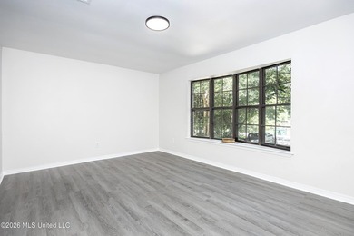 Stunning newly renovated white brick home in DOWNTOWN GOLF CART - photo 10