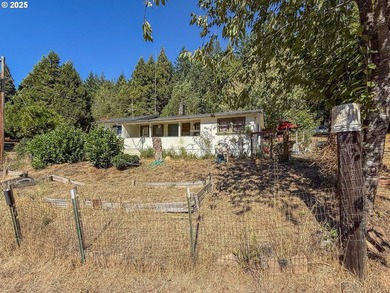 A gated entrance reveals this stunning 24-acre secluded parcel - photo 1