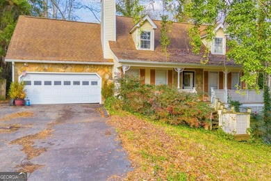 Lake Home For Sale in Flowery Branch, Georgia