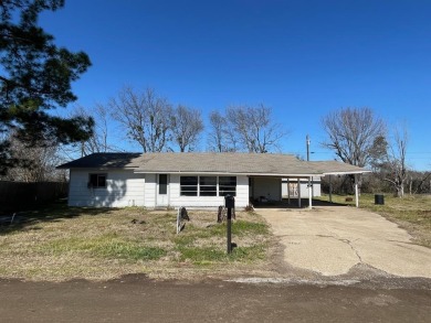 Lots of potential!!  This 3 bedroom, 1.5 bath home does need TLC - Lake Home For Sale in Trinidad, Texas