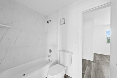 Stunning fully renovated 3-bedroom, 2-bath townhome located in - photo 12