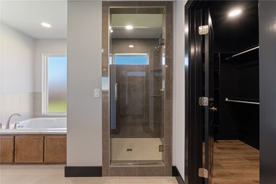 Take a look at this one-level new construction home located on a - photo 21