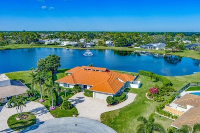 Lake Home For Sale in Palm Beach Gardens, Florida