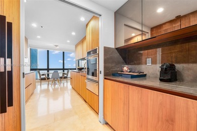 Discover luxury waterfront living in this exceptional 2 bedroom