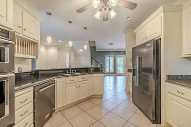 Welcome to this beautiful brick home perfectly situated on the - photo 11