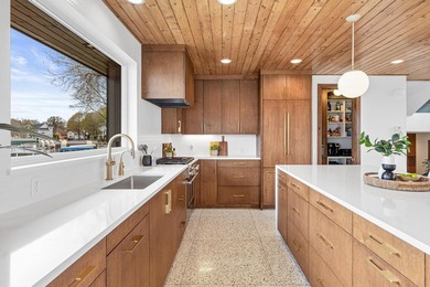 Welcome to 4919 Three Points Blvd, an awe-inspiring custom-built - photo 17