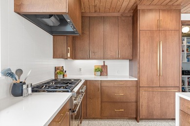 Welcome to 4919 Three Points Blvd, an awe-inspiring custom-built - photo 18