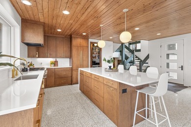 Welcome to 4919 Three Points Blvd, an awe-inspiring custom-built - photo 22