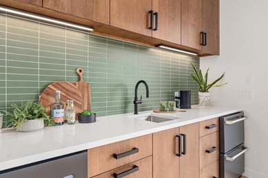 Welcome to 4919 Three Points Blvd, an awe-inspiring custom-built - photo 32