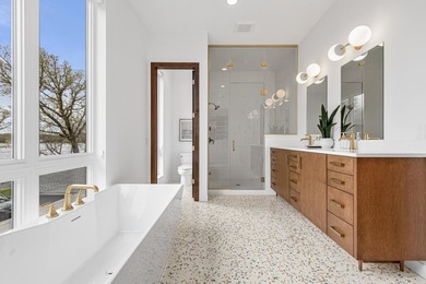 Welcome to 4919 Three Points Blvd, an awe-inspiring custom-built - photo 49