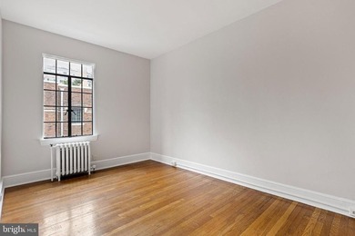This corner unit is located on the top floor of the historic - photo 18