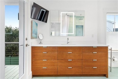 Experience beach living in this fully renovated 2022 residence - photo 19