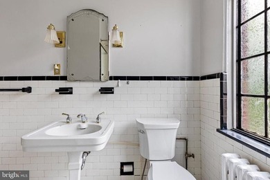 This corner unit is located on the top floor of the historic - photo 21