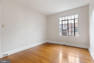 This corner unit is located on the top floor of the historic - photo 23